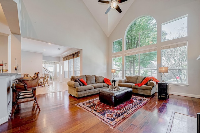 15614 Stable Brook Cir, Cypress, TX 77429 - living area with healthy amount of natural light, hardwood / wood-style flooring, and high vaulted ceiling