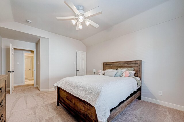 15614 Stable Brook Cir, Cypress, TX 77429 - bedroom featuring light colored carpet, vaulted ceiling, baseboards, and a ceiling fan