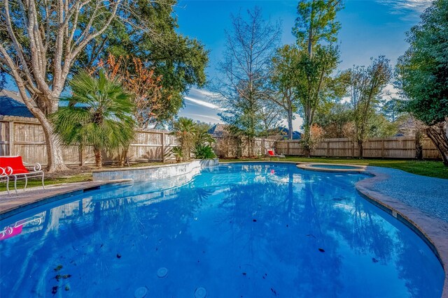 15614 Stable Brook Cir, Cypress, TX 77429 - view of pool featuring a fenced backyard and a pool with connected hot tub