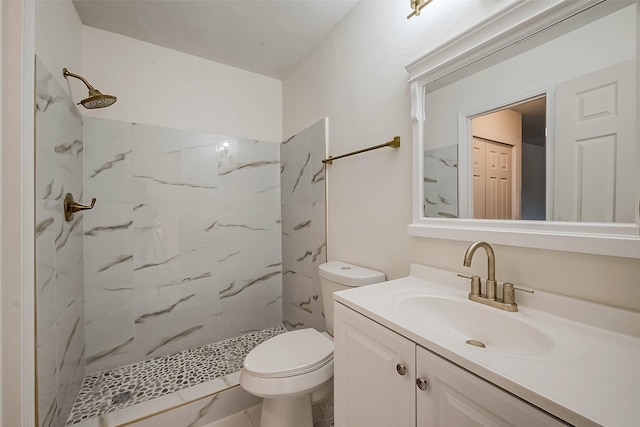 12632 Newbrook Dr, Houston, TX 77072 - bathroom with vanity, a marble finish shower, toilet, and marble look tile flooring