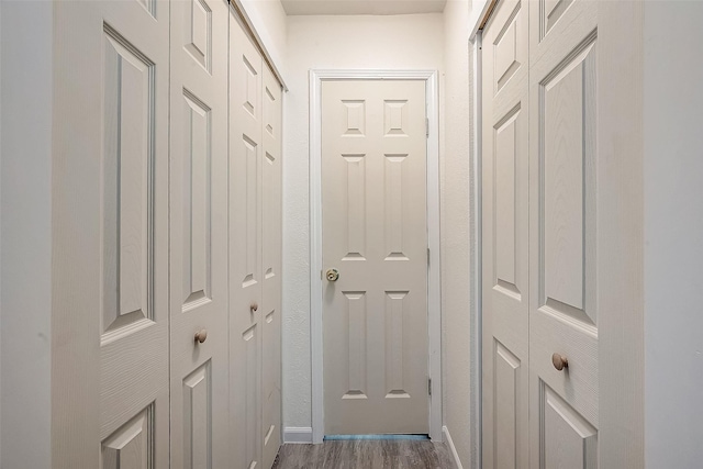 12632 Newbrook Dr, Houston, TX 77072 - doorway to outside featuring wood finished floors and baseboards