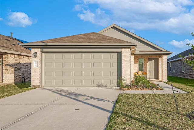 5418 Wyndham Ridge Ln, Spring, TX 77373 - ranch-style home featuring concrete driveway, an attached garage, a front yard, and brick siding