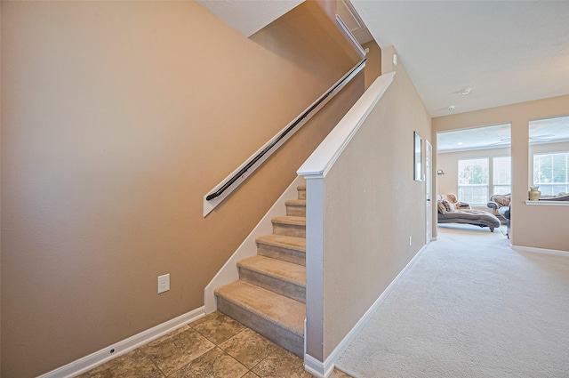5018 Longlane Dr, Houston, TX 77084 - stairway featuring baseboards