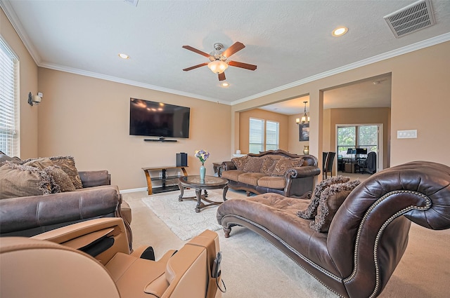 5018 Longlane Dr, Houston, TX 77084 - living room featuring light carpet, ceiling fan, baseboards, recessed lighting, and a chandelier