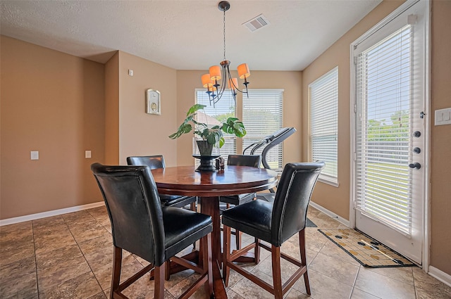 5018 Longlane Dr, Houston, TX 77084 - dining space featuring a chandelier and baseboards