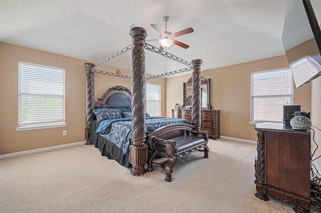5018 Longlane Dr, Houston, TX 77084 - carpeted bedroom with baseboards, multiple windows, vaulted ceiling, and ceiling fan