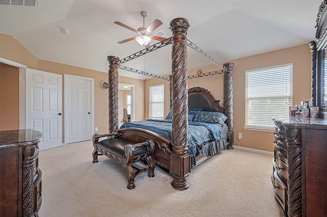 5018 Longlane Dr, Houston, TX 77084 - bedroom with lofted ceiling, light carpet, multiple windows, baseboards, and a ceiling fan