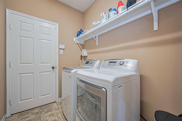 5018 Longlane Dr, Houston, TX 77084 - laundry area with independent washer and dryer and baseboards