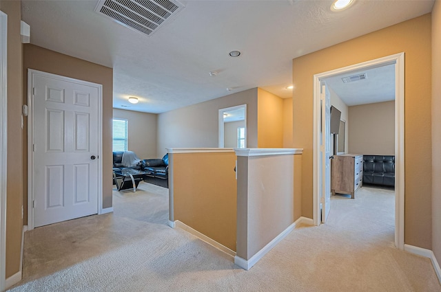 5018 Longlane Dr, Houston, TX 77084 - corridor with light colored carpet, an upstairs landing, baseboards, and recessed lighting