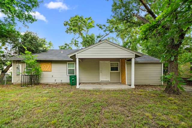 5835 Southseas St, Houston, TX 77033 - view of front of house featuring a patio and a shingled roof