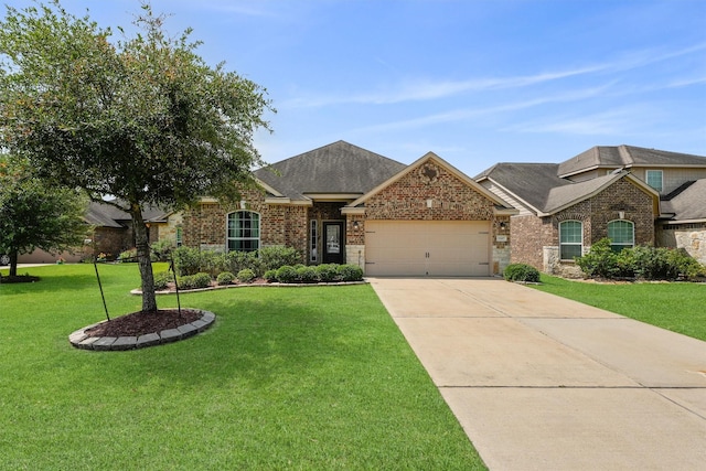 22607 August Crow Dr, Hockley, TX 77447 - view of front of home with brick siding, a garage, a front yard, and concrete driveway