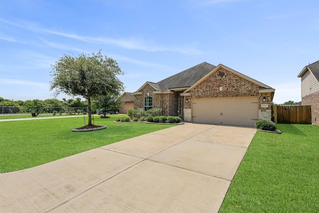 22607 August Crow Dr, Hockley, TX 77447 - view of front of property featuring a garage, concrete driveway, brick siding, and roof with shingles