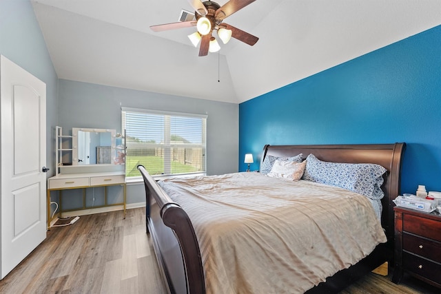 22607 August Crow Dr, Hockley, TX 77447 - bedroom with vaulted ceiling, wood finished floors, and ceiling fan