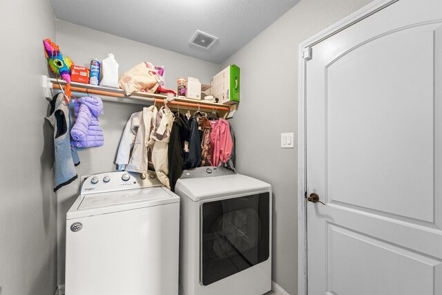 22607 August Crow Dr, Hockley, TX 77447 - clothes washing area featuring independent washer and dryer