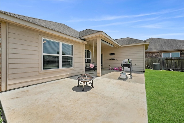22607 August Crow Dr, Hockley, TX 77447 - view of patio / terrace featuring a fire pit, central air condition unit, and a grill