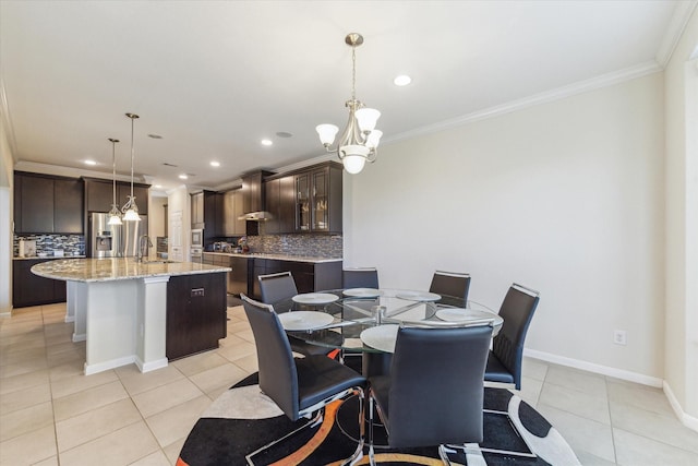 6015 Turner Shadow Ln, Sugar Land, TX 77479 - dining space with a chandelier, light tile patterned floors, ornamental molding, recessed lighting, and baseboards