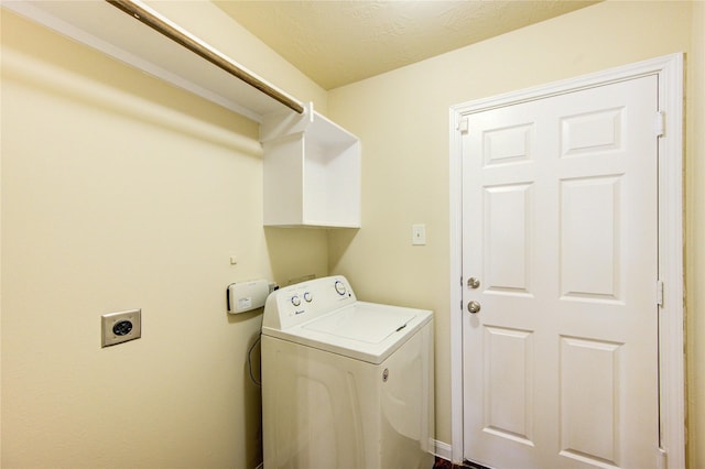 15531 Kiplands Bend Dr, Houston, TX 77014 - clothes washing area with washer / dryer and a textured ceiling