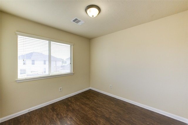 15531 Kiplands Bend Dr, Houston, TX 77014 - unfurnished room with dark wood-style floors and baseboards