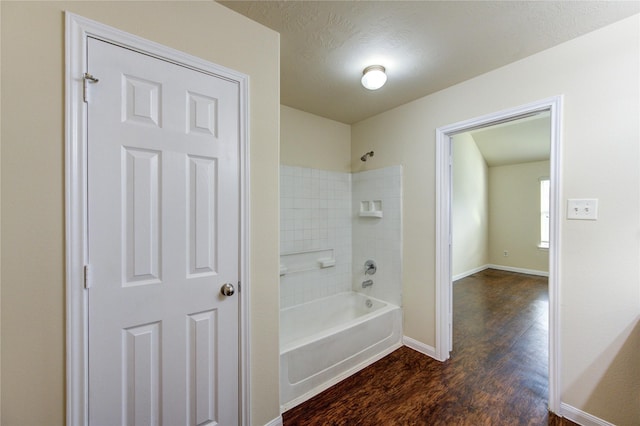 15531 Kiplands Bend Dr, Houston, TX 77014 - full bathroom with wood finished floors, baseboards, and shower / bathtub combination