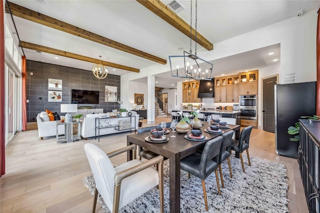 1922 Kessler Point Pl, Katy, TX 77493 - dining area featuring a chandelier, light wood-style flooring, beamed ceiling, recessed lighting, and tile walls