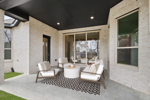 15212 Deseo Dr, Conroe, TX 77302 - view of patio with an outdoor living space