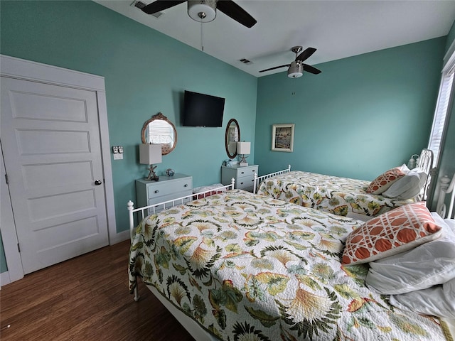 833 Kahla Dr, Crystal Beach, TX 77650 - bedroom with wood finished floors, baseboards, and ceiling fan
