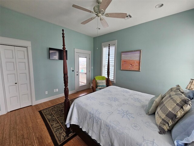 833 Kahla Dr, Crystal Beach, TX 77650 - bedroom with wood finished floors, access to outside, baseboards, and ceiling fan