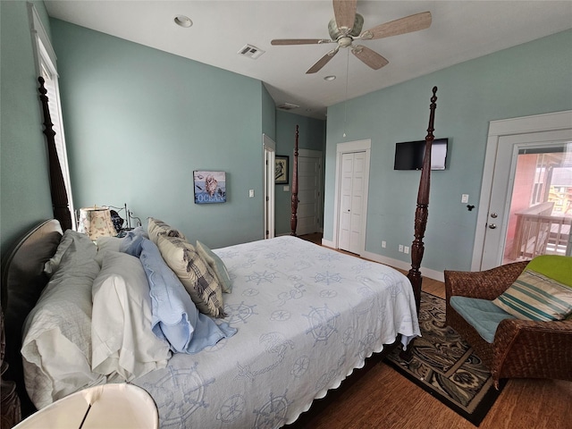 833 Kahla Dr, Crystal Beach, TX 77650 - bedroom with dark wood finished floors, a closet, a ceiling fan, baseboards, and recessed lighting