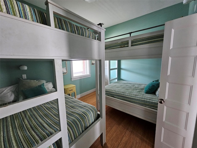 833 Kahla Dr, Crystal Beach, TX 77650 - bedroom featuring wood finished floors and baseboards