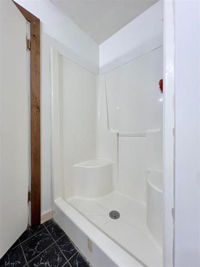 880 E Tram Rd, Vidor, TX 77662 - full bath featuring marble finish floors and a shower