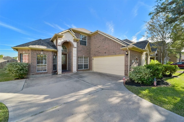 1214 Riverchase Dr, Richmond, TX 77469 - view of front of property featuring brick siding, concrete driveway, an attached garage, and roof with shingles