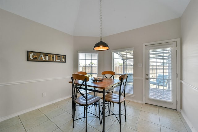 1214 Riverchase Dr, Richmond, TX 77469 - dining room featuring baseboards, light tile patterned flooring, and high vaulted ceiling