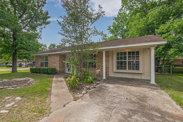 210 N Shirley Ln, Willis, TX 77378 - single story home featuring brick siding