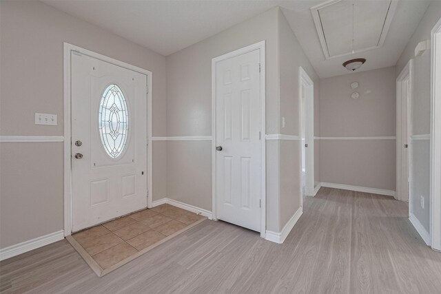 210 N Shirley Ln, Willis, TX 77378 - foyer featuring light wood-style flooring and baseboards