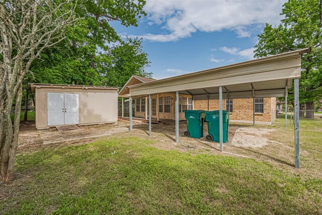 210 N Shirley Ln, Willis, TX 77378 - view of yard with an outbuilding and a storage shed