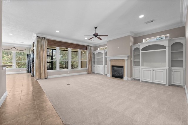 11510 Walden Rd, Montgomery, TX 77356 - unfurnished living room with a ceiling fan, baseboards, crown molding, recessed lighting, and a glass covered fireplace