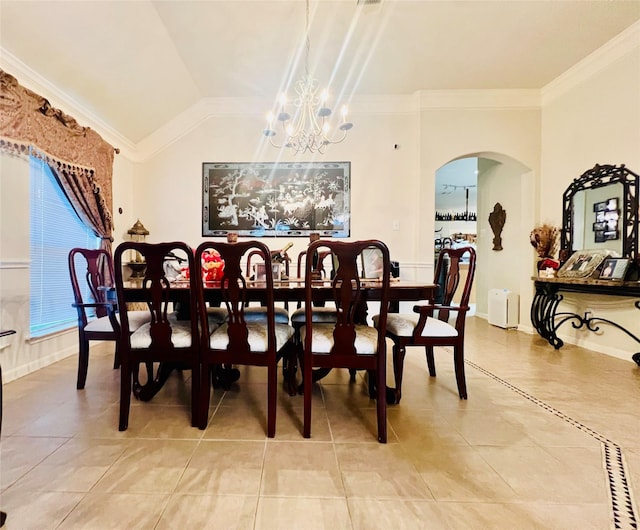 12931 Blackbrook Ln, Houston, TX 77041 - dining space featuring arched walkways, light tile patterned flooring, ornamental molding, a chandelier, and lofted ceiling