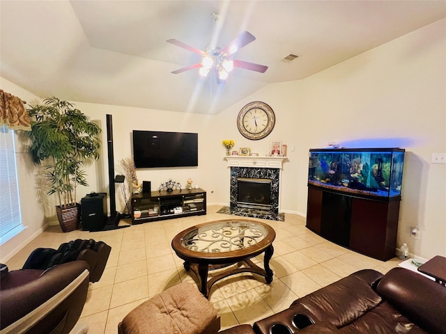 12931 Blackbrook Ln, Houston, TX 77041 - tiled living area featuring lofted ceiling, ceiling fan, a high end fireplace, and baseboards