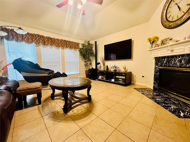 12931 Blackbrook Ln, Houston, TX 77041 - living area featuring a ceiling fan, light tile patterned floors, a high end fireplace, and lofted ceiling