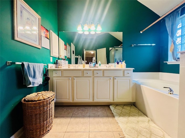 12931 Blackbrook Ln, Houston, TX 77041 - bathroom featuring a stall shower, tile patterned floors, a bath, and double vanity