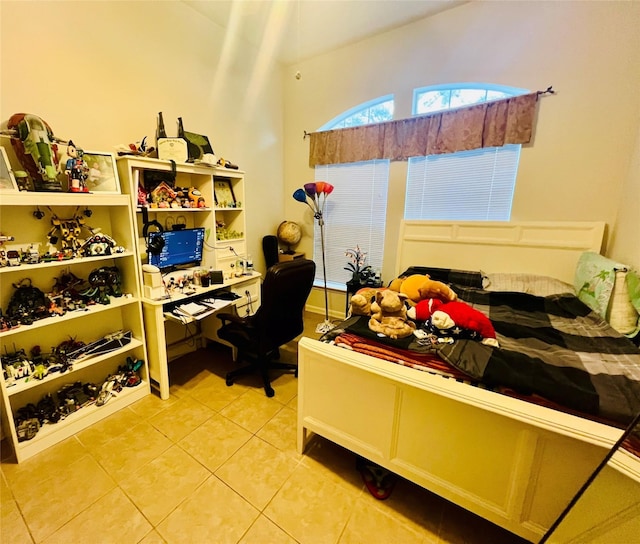 12931 Blackbrook Ln, Houston, TX 77041 - bedroom featuring light tile patterned floors and an office area