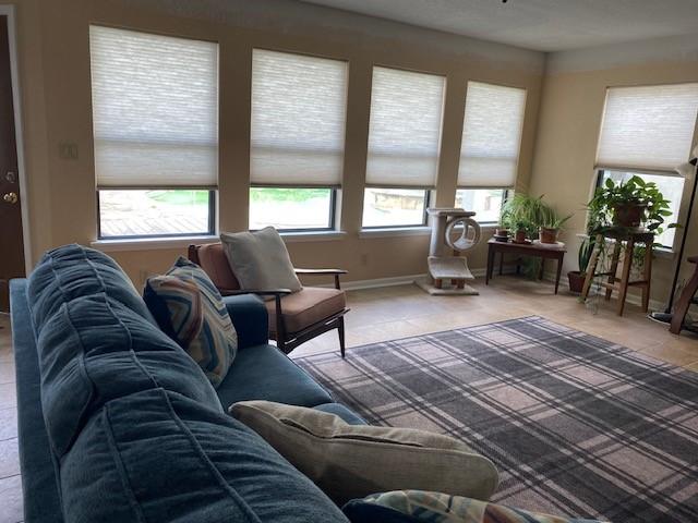21626 Gentry Rd, Cypress, TX 77429 - living room with tile patterned flooring