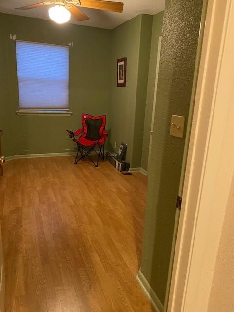 21626 Gentry Rd, Cypress, TX 77429 - unfurnished room featuring a ceiling fan and wood finished floors