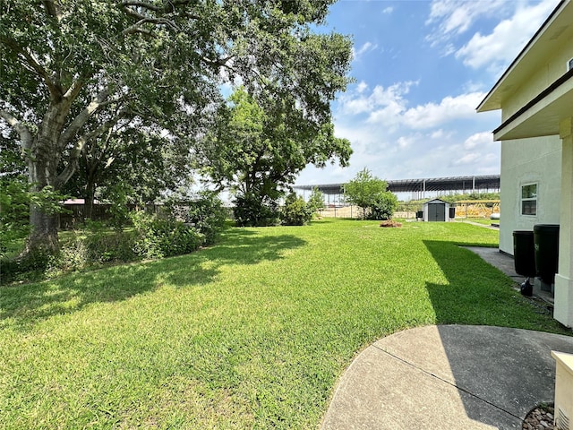 21626 Gentry Rd, Cypress, TX 77429 - view of yard with a shed and an outdoor structure