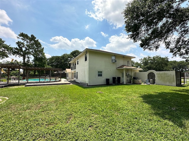 21626 Gentry Rd, Cypress, TX 77429 - back of property with a pergola and an outdoor pool