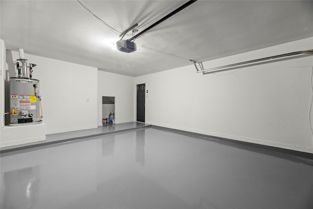 17027 Sperry Landing Dr, Houston, TX 77095 - garage featuring gas water heater, a garage door opener, and baseboards