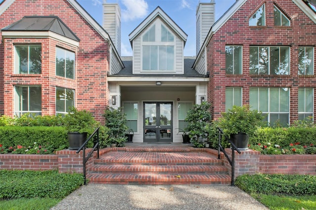 1330 Old Spanish Trl Unit 7207, Houston, TX 77054 - property entrance with french doors and a chimney