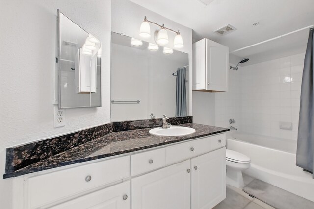 1330 Old Spanish Trl Unit 7207, Houston, TX 77054 - bathroom with vanity, toilet, shower / bath combination with curtain, and tile patterned flooring