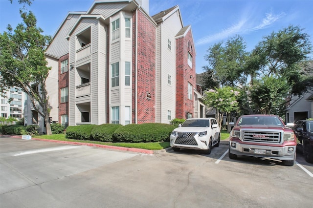 1330 Old Spanish Trl Unit 7207, Houston, TX 77054 - view of building exterior with uncovered parking