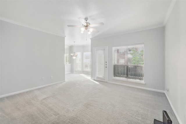 1330 Old Spanish Trl Unit 7207, Houston, TX 77054 - spare room featuring crown molding, ceiling fan, a chandelier, baseboards, and carpet flooring